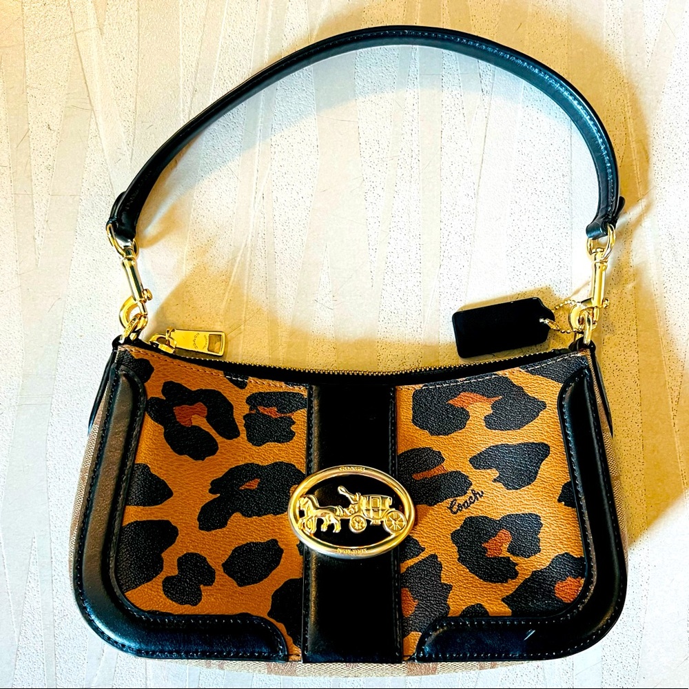 Coach mini bag cheetah print. Like new.